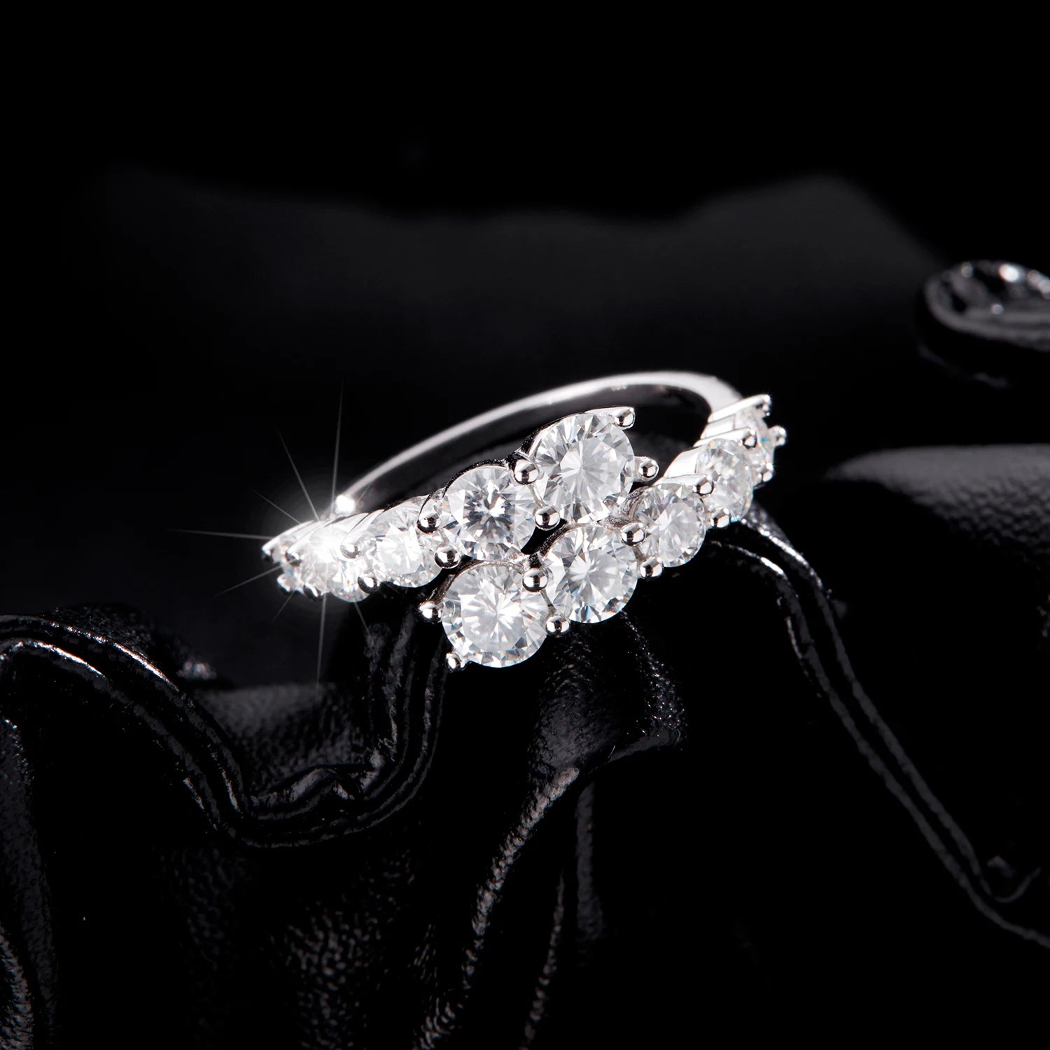 Diamond ring on a dark background